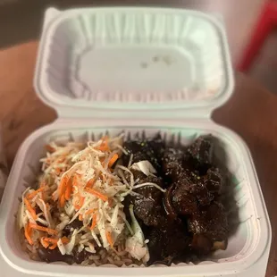 Jerk Pork with rice  and peas and coleslaw