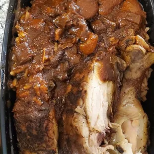 This is the likkle more chix jerk plate. Rice and peas with oxtail.gravy.