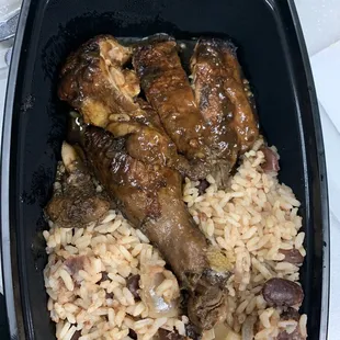 Jerk chicken with Rice Peas.