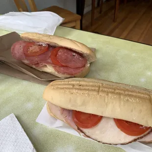 Italian salame sandwich on left and combination sandwich on right.