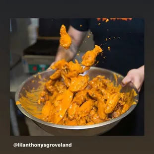 Chicken Wings tossed in hot sauce !