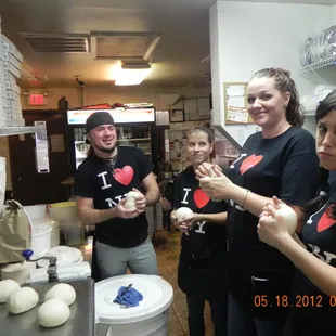 OUR STAFF ROLLING FRESH DOUGH