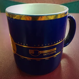 So quaint...drinking from a 1992 commemorative coffee cup!