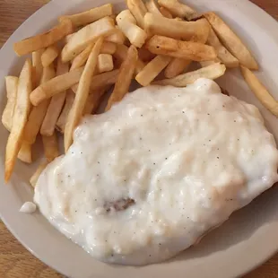 Country fried steak and fries.