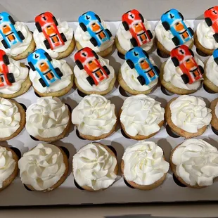 Race car topper and whipped cream topped mini cupcakes