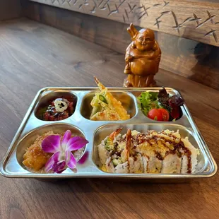 Buddha&apos;s Bento Box now available at lil&apos; Buddha&apos;s! Come in for lunch, dinner or place a to-go order!