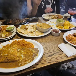 Up close is the pork chimichanga, smoky fajitas in the back, big red burrito to my right.