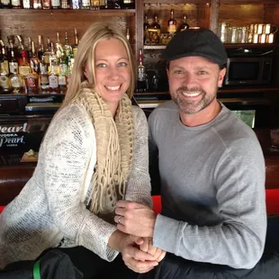 a man and a woman posing for a picture