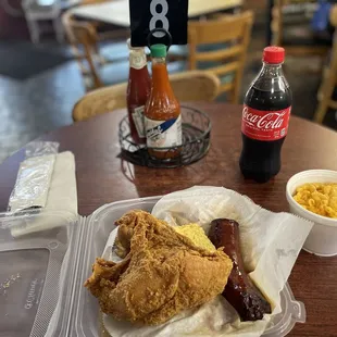 White beans and rice with smoked sausage, an additional smoked sausage link, fried chicken (white meat), cornbread, and mac and cheese.