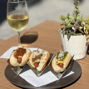 Mini hot dogs and a house Chardonnay