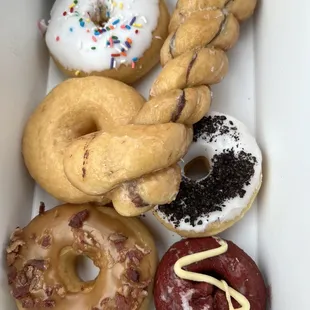 a variety of donuts in a box