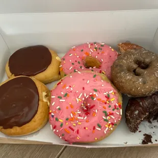 a variety of donuts in a box