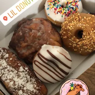 a variety of donuts in a box