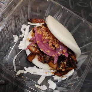 Veg bao bun with wild mushrooms, hoisin, sambaal, crispy shallot and pickle
