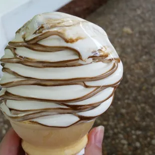 A half eaten coffee &amp; cream