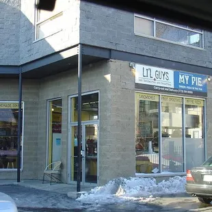 a car parked in front of a store