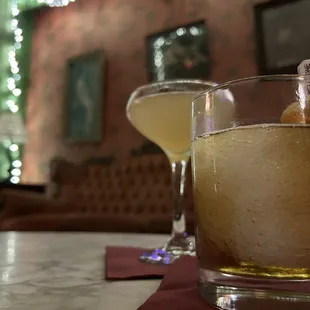 Old fashioned and surprise cocktail.