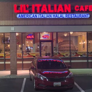  car parked in front of the restaurant