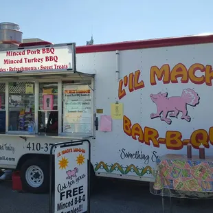 a man standing in front of a food truck