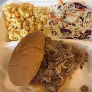 Pulled pork sandwich, mac n cheese, coleslaw and a bottle of soda for $10