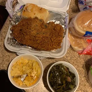 a meal in a styrofoam container