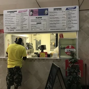 a man standing in front of the counter