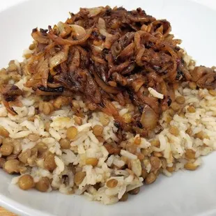 a bowl of rice and onions