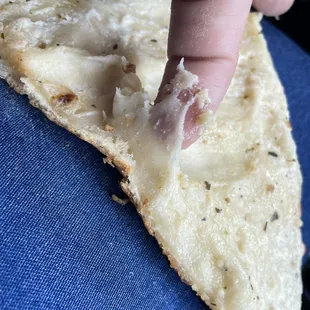 Raw Pizza dough bellow a Casper pizza