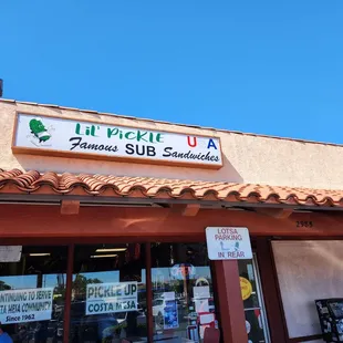 Additional parking behind the store. There's a door back there too.