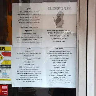 Menu and drink specials posted in window