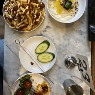 Octopus, fries, and hummus