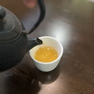 No better art photo than pouring tea