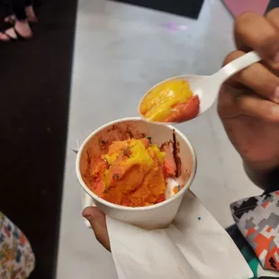 A sherbert topped with chocolate