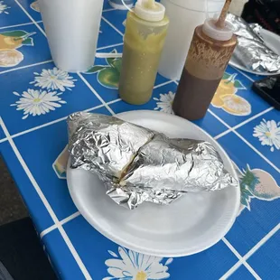 Big portions of Agua fresca and breakfast  burrito