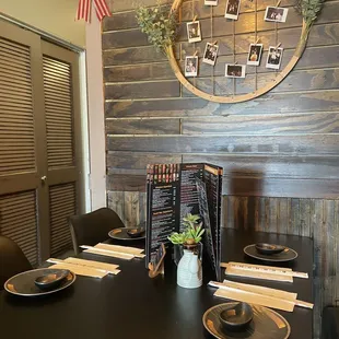 a dining table with place settings