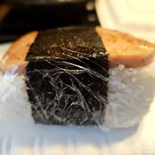 Lunch@Liliha Drive Inn/Take-Out; 10/12/2024. I ordered their *Spam Musubi*, while we're Watching Da UH Football game right now.Eat it later?