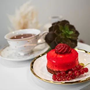 a red cake and a cup of tea