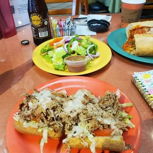 Gluten Free baguette Chicken cheese steak and vegan (dairy free) provolone cheese + side salad