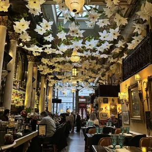 Beautiful restaurant with flowers on the ceiling all part of that