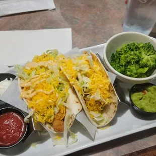 Fried fish tacos with side of broccoli