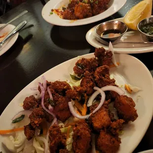 Chicken 65 &amp; Gobhi Manchurian (battered fried cauliflower)..what&apos;s left of it