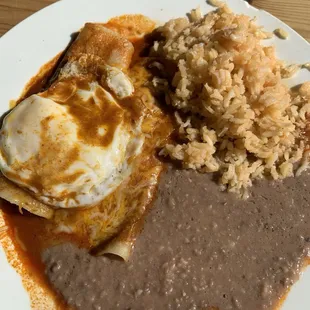 Eggs Rancheros - cheese enchiladas in mole sauce w/eggs.
