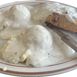 Chicken fried steak with a double order of mashed potatoes and gravy.