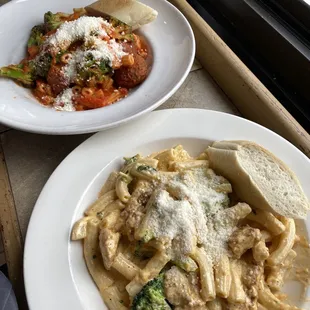 The best of both worlds; one white sauce pasta and one red sauce pasta