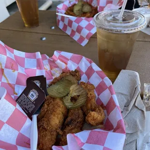 Chicken Tenders (front is mild, back is spicy) with sweet iced tea and homemade ranch (back)