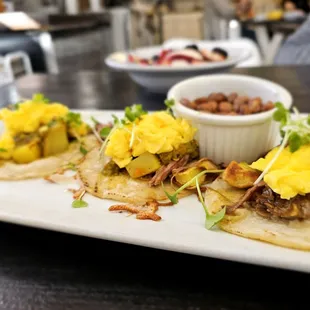 Short-Rib Street Tacos with eggs, corn tortillas, potatoes, green chile, and beans
