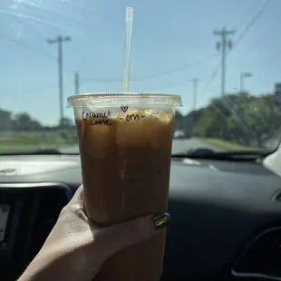 Caramel Iced Latte with oat milk and caramel drizzle (they wrote a heart on my order!!)