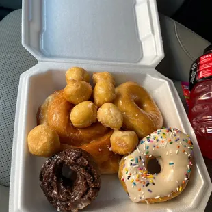 donuts in a styrofoam container
