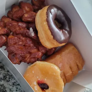 Fritter, bear claw, raspberry jelly filled, chocolate glazed