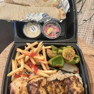 Chicken Kebab plate, fries, veggies, rice pilaf, pita bread